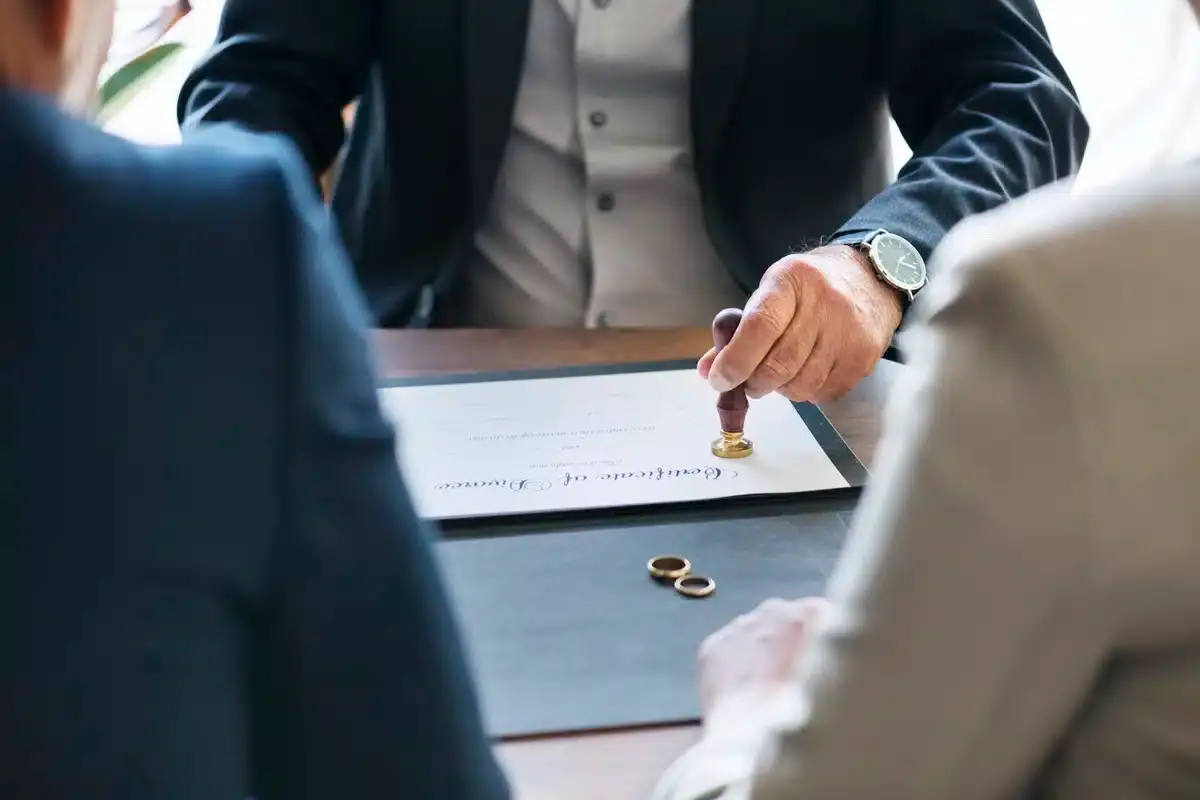 Person in business attire in a mediation meeting